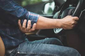 man with elbow injury