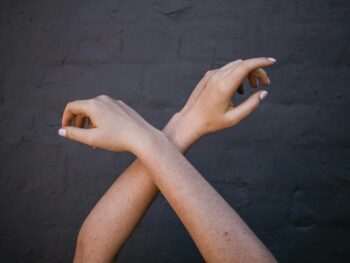 Person holding up their arms